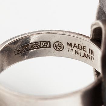 Eila Minkkinen, A sterling silver ring "Wild rose" with a sodalit. Kalevala Koru, Helsinki 1973.