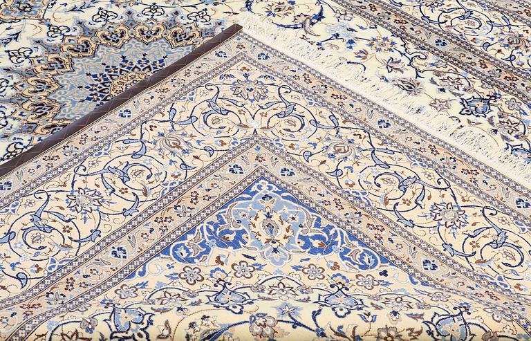 A carpet, Nain part silk s.k 9LAA, ca 355 x 260 cm.