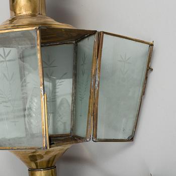 A pair of brass coach carriage lamps, around the turn of the century 1900.