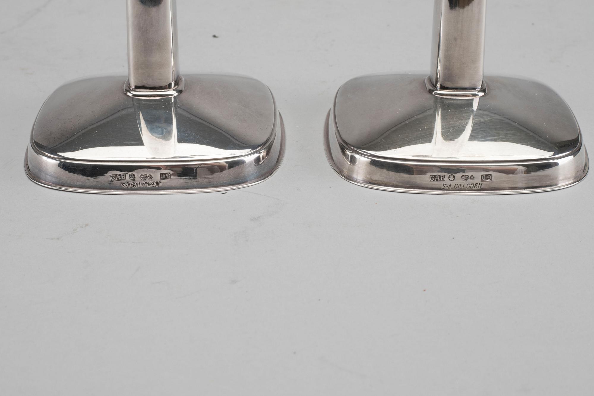A PAIR OF SILVER CANDLESTICKS BY SA GILLGREN.