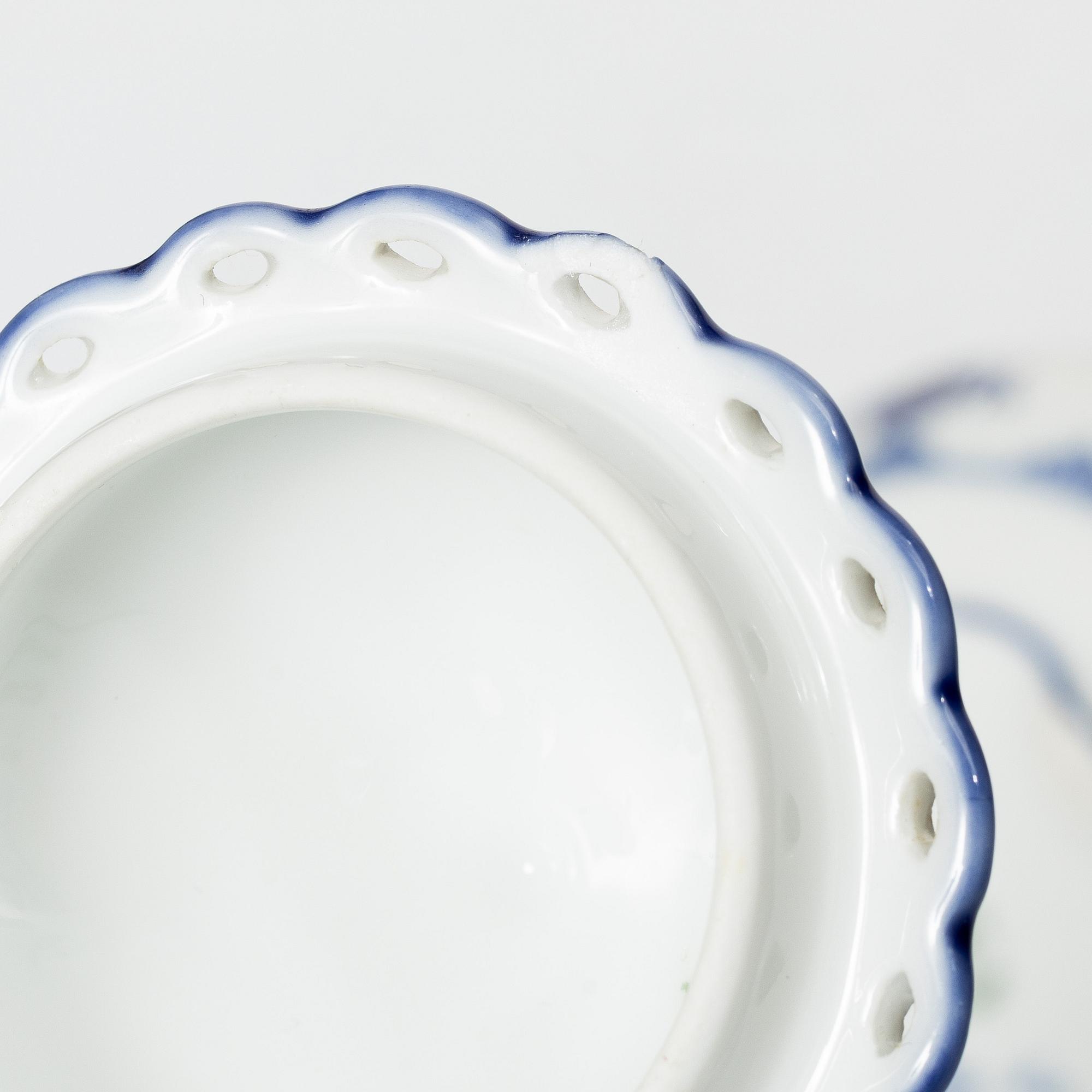 Royal Copenhagen, A 'Blue Fluted' full lace porcelain potpurri urn with cover, model 1/1186, Denmark, 1889-1922.