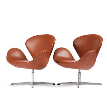 78. Arne Jacobsen, a pair of "Swan" chairs, Fritz Hansen, Denmark, 1980.