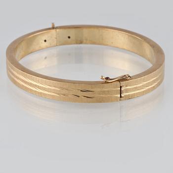 ARMRING, 14K guld, utländska stämplar. Vikt 26,2 gram.