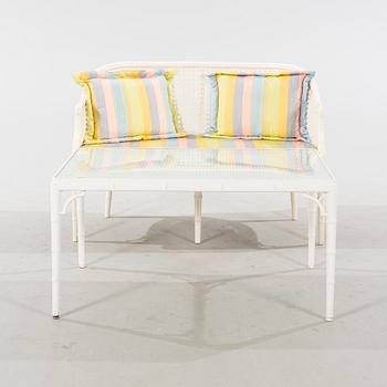 A late 20th century Miranda sofa and table.