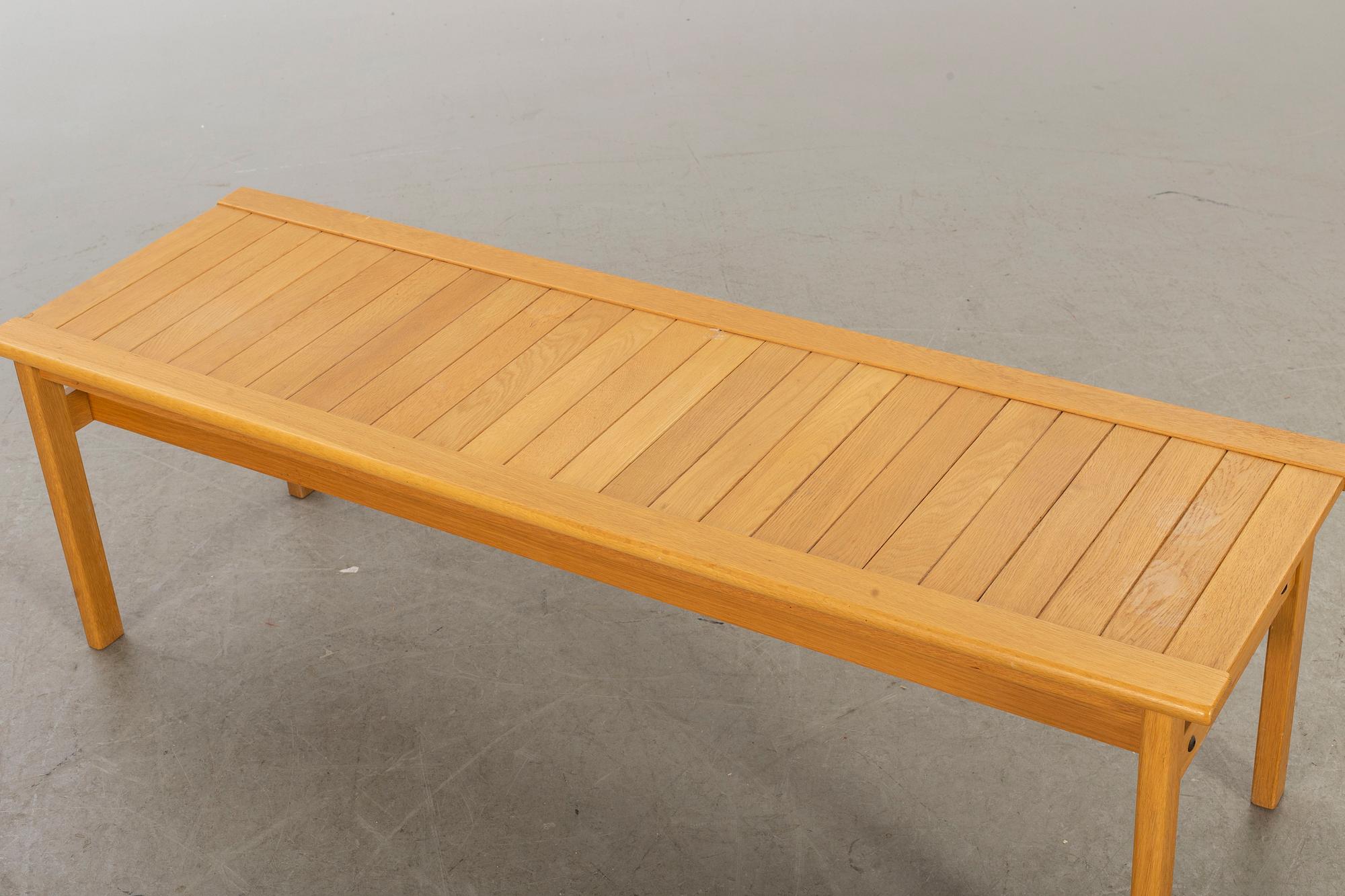AN 1988 OAK BENCH LAMMHULT, SWEDEN.