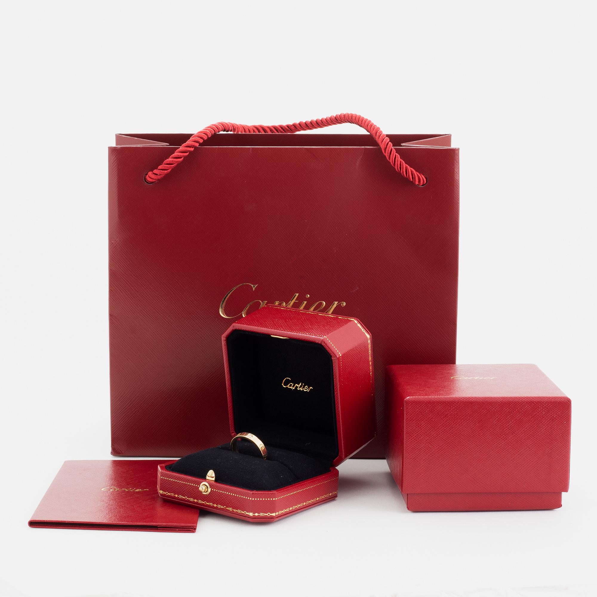 Cartier ring "Love" 18K guld med en rund briljantslipad diamant.