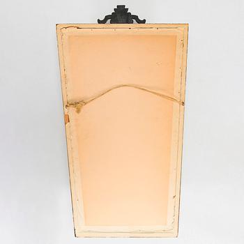 A 1920s Art Deco mirror.