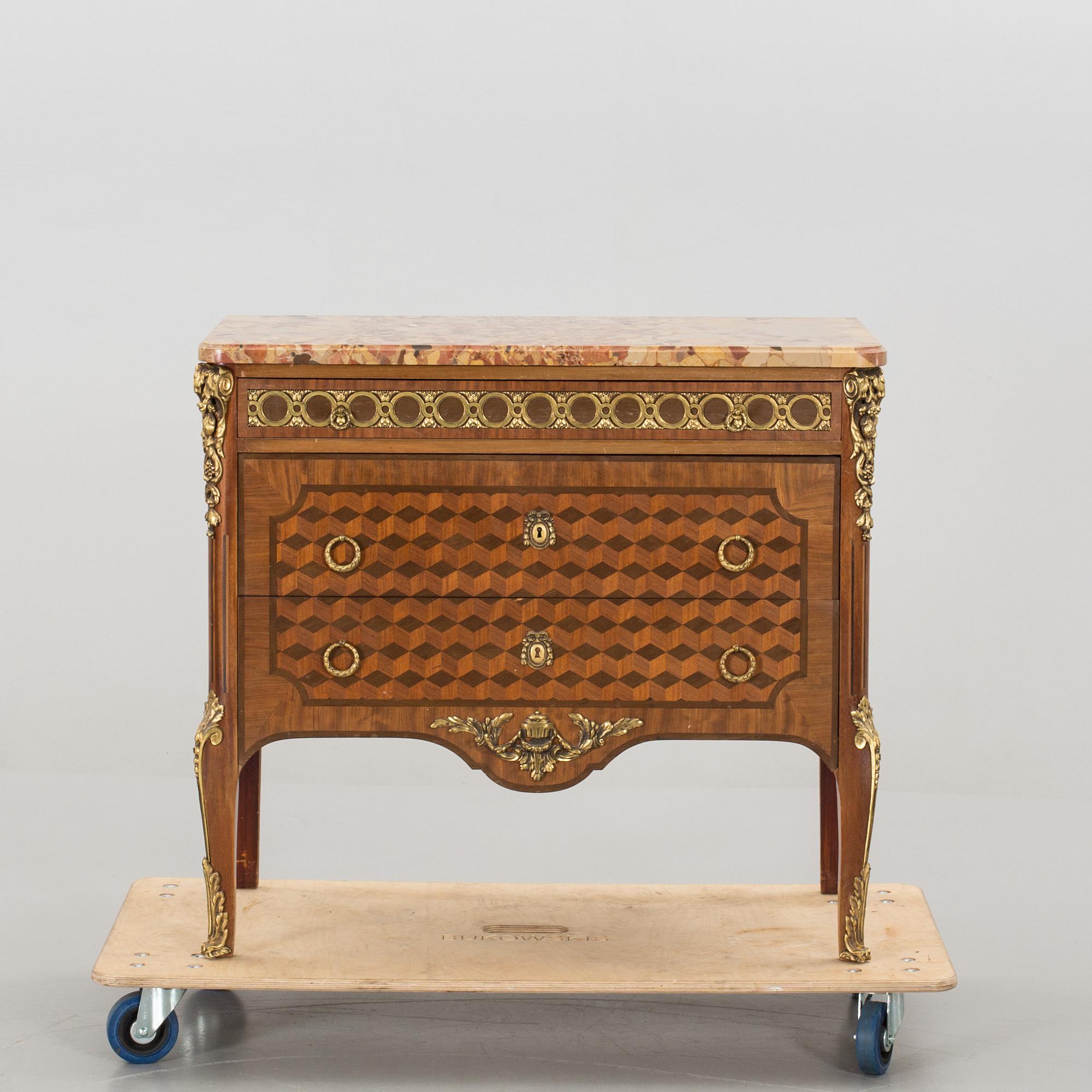 A Louis XVI-style bureau around 1900.