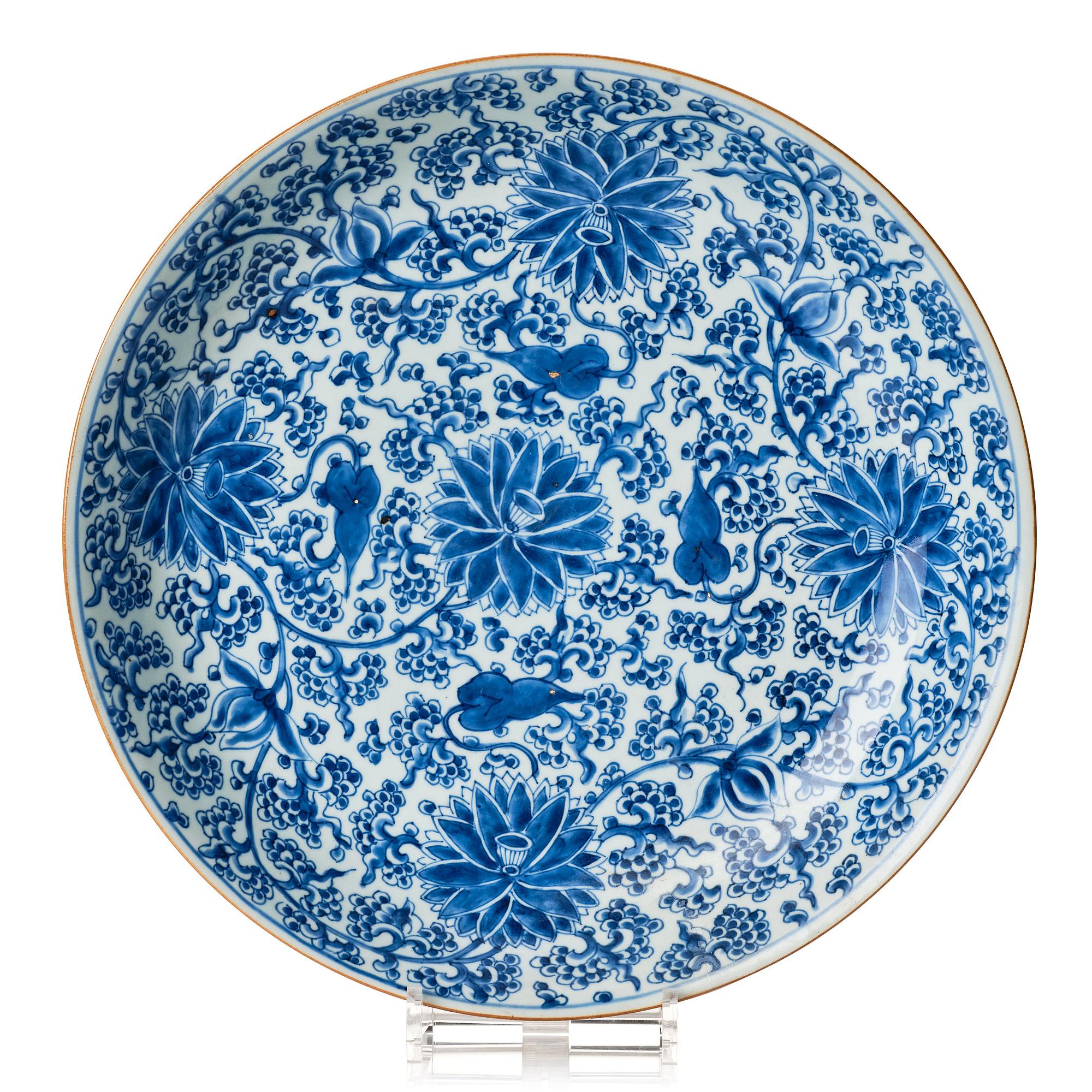 A blue and white lotus charger, Qing dynasty, Kangxi (1662-1722).