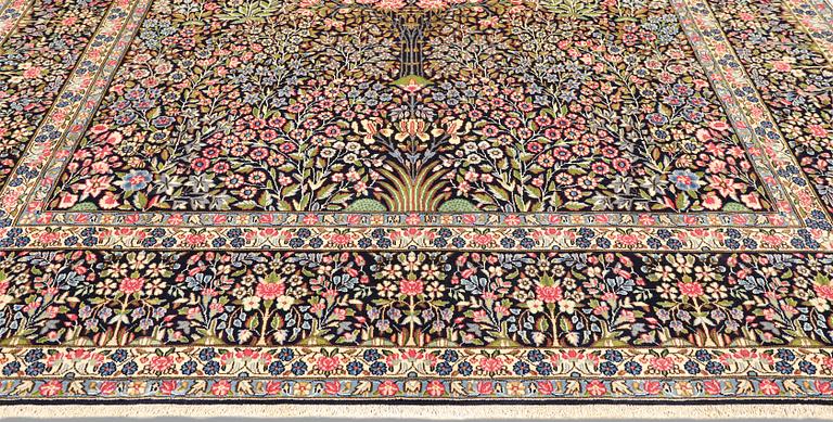 A Kirman Laver carpet, 'Millefleur', approx. 388 x 300 cm.