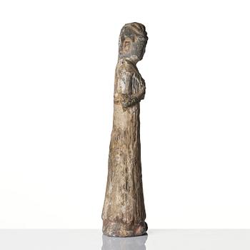 A pottery figure of a lady, Han dynasty (220 BC-206 AD).