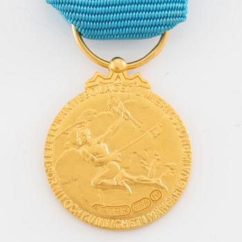 Medal, 14k gold, LM Ericsson, for merit and skill.