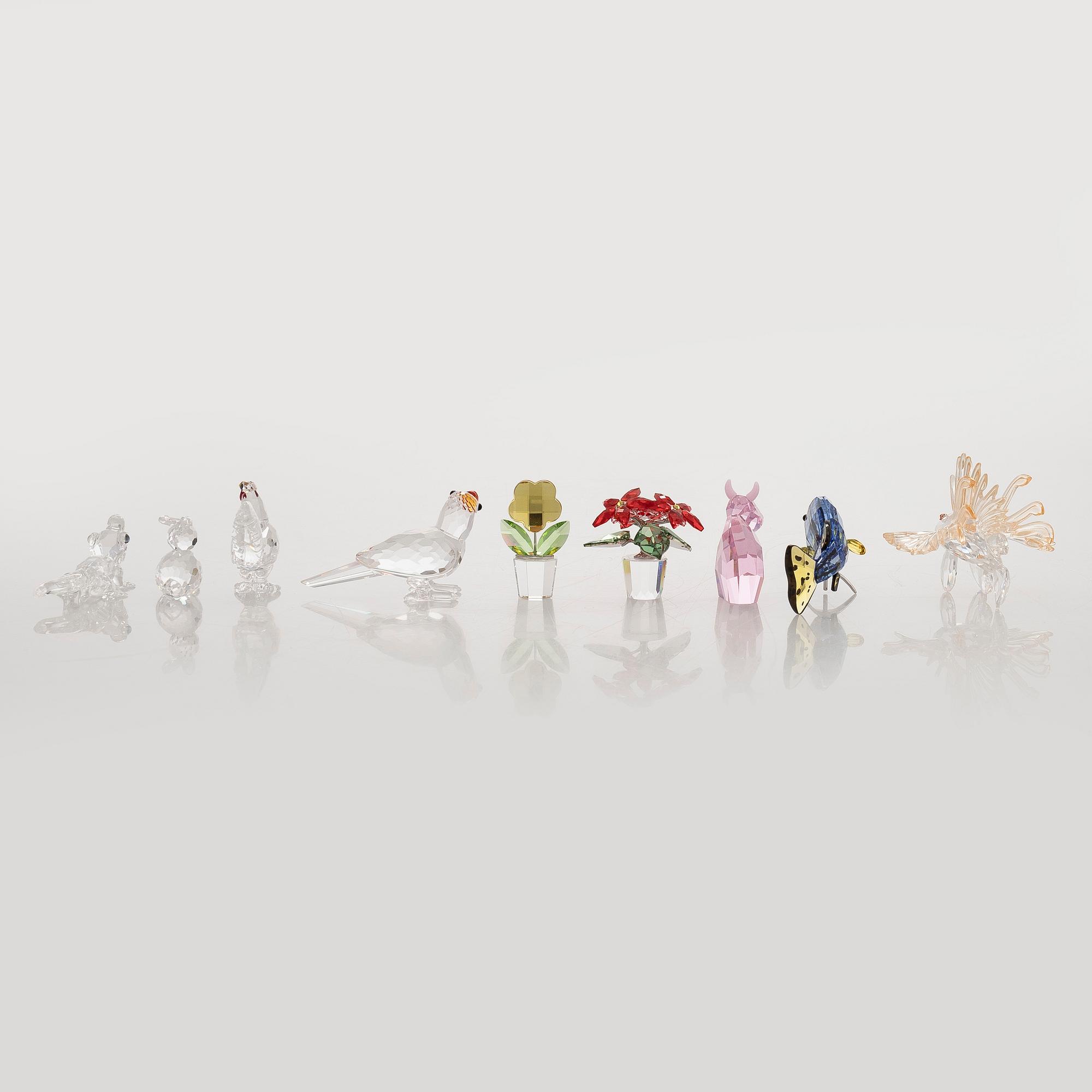 Swarovski, a set of 9 crystal figurines, late 20th century.