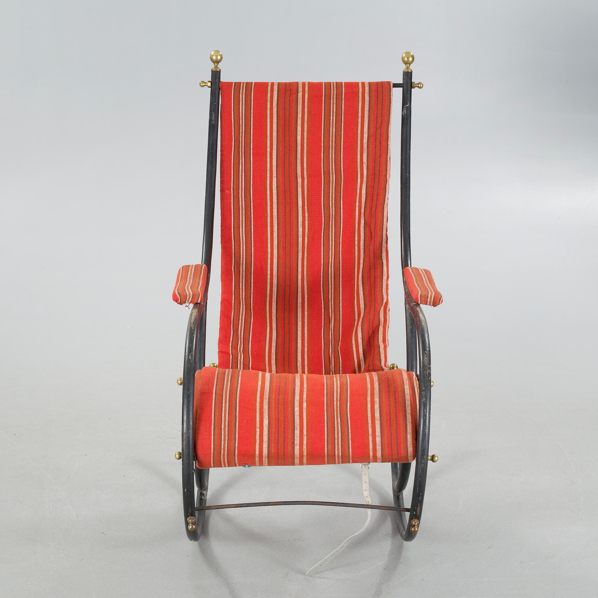 A 19th century rocking chair, probably Robert W. Winfield.