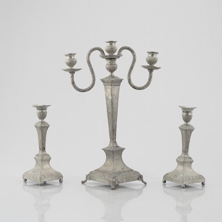 Candelabrum and two candlesticks, tin, by Nils Justelius and Niclas Anström, Eksjö and Växjö, first half of the 19th century.