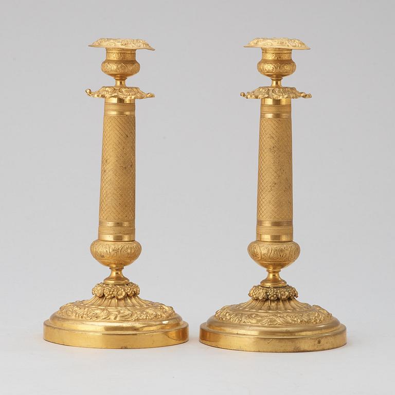 A pair of Russian 1830/40's brass candlesticks.