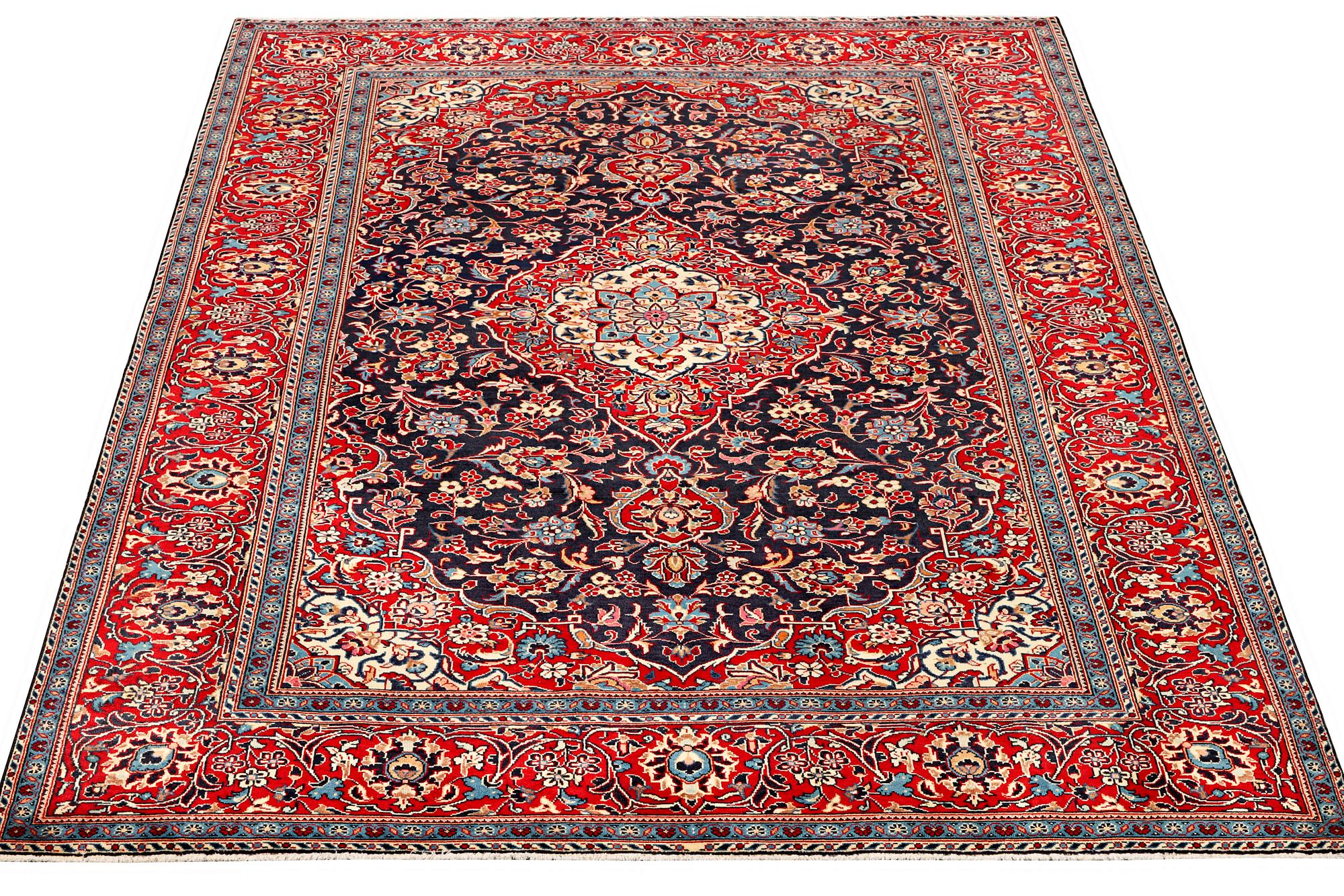 A Kashan carpet. a. 300 x 195 cm.