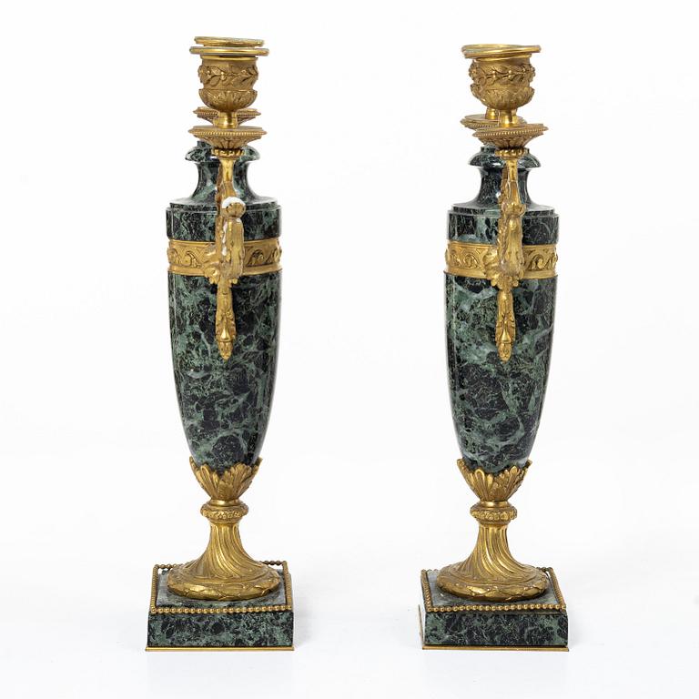 A pair of candelabras, around 1900.