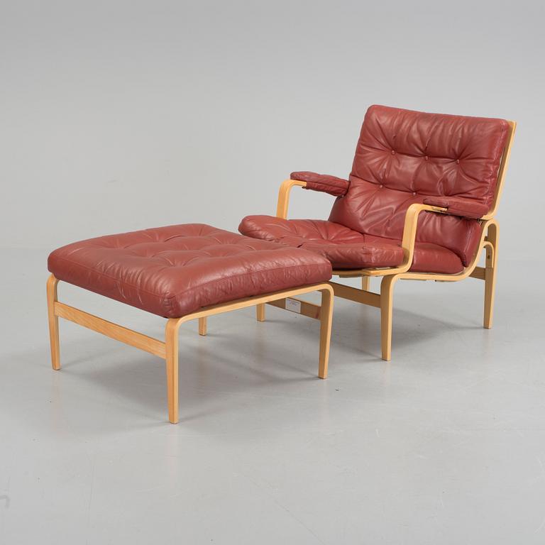 BRUNO MATHSSON, "Ingrid", fåtölj och fotpall, DUX design, 1969.