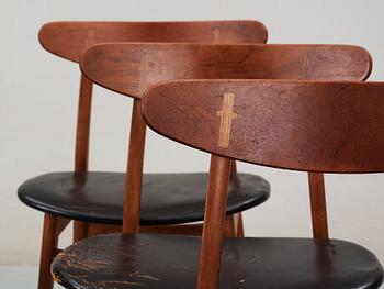 Four Hans J Wegner 'CH-30' teak and black leather chairs, Denmark, 1950-60's.