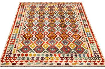 A Kilim carpet, c. 298 x 205 cm.