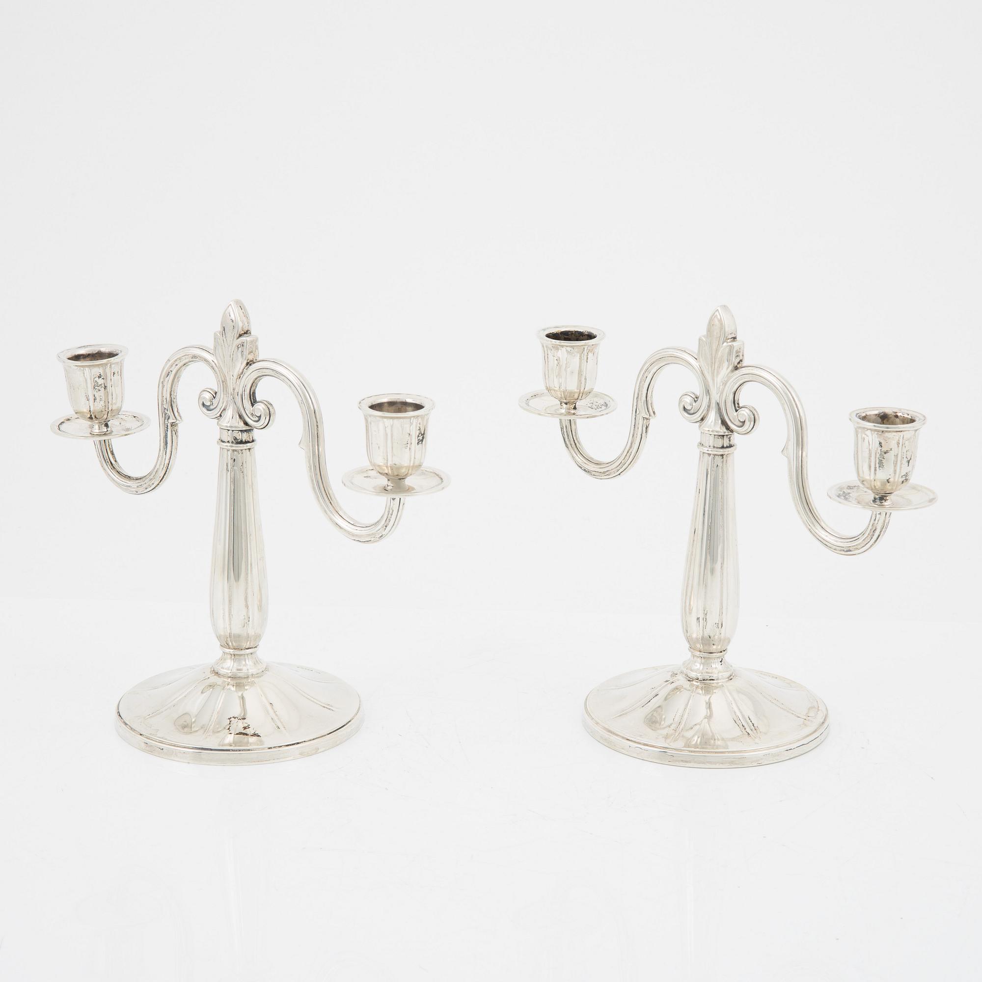 A pair of Swedish silver candelabra, mark of GAB, Stockholm 1931.