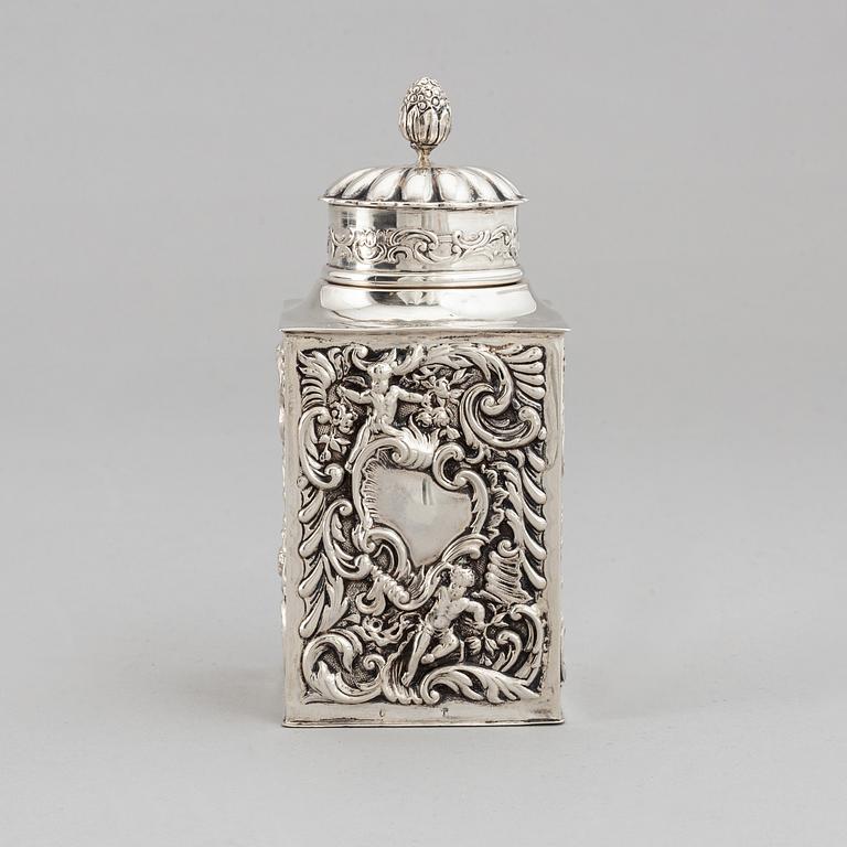 A silver tea caddy, mark of William Comyns & Sons,  London 1898.