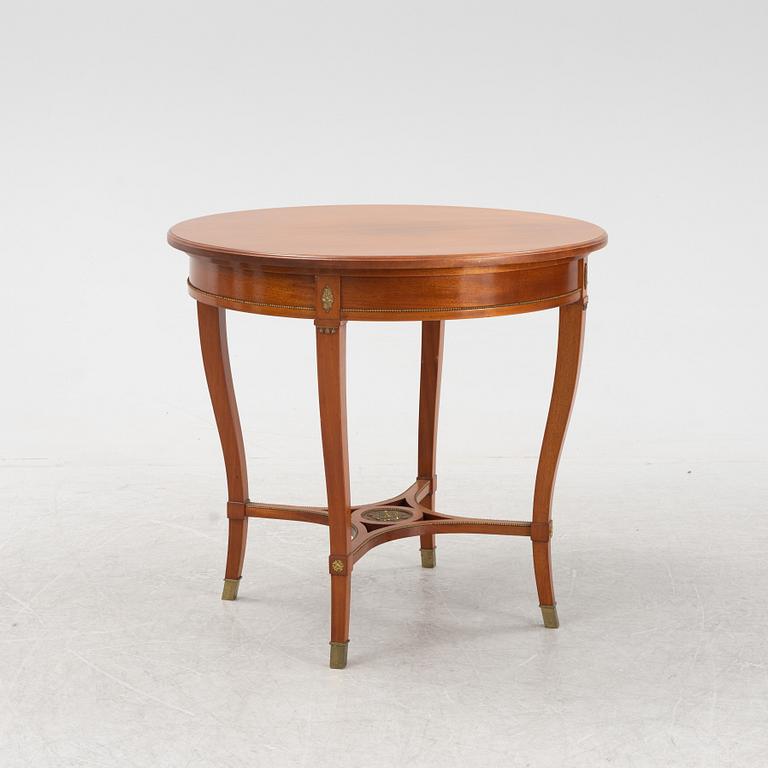 A mahogany empire style table, Nordiska Kompaniet.