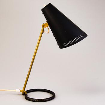 A mid-20th-century table lamp, model  K11-15 for Idman, Finland.