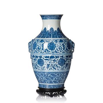 1345. A blue and white vase, with Qianlong mark.