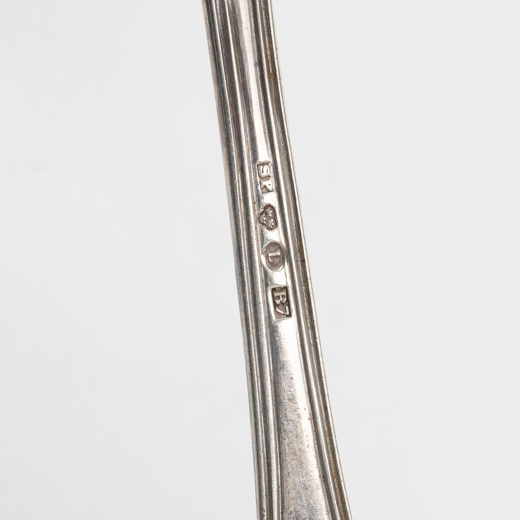 Nine Swedish silver spoons, 1843–1915.