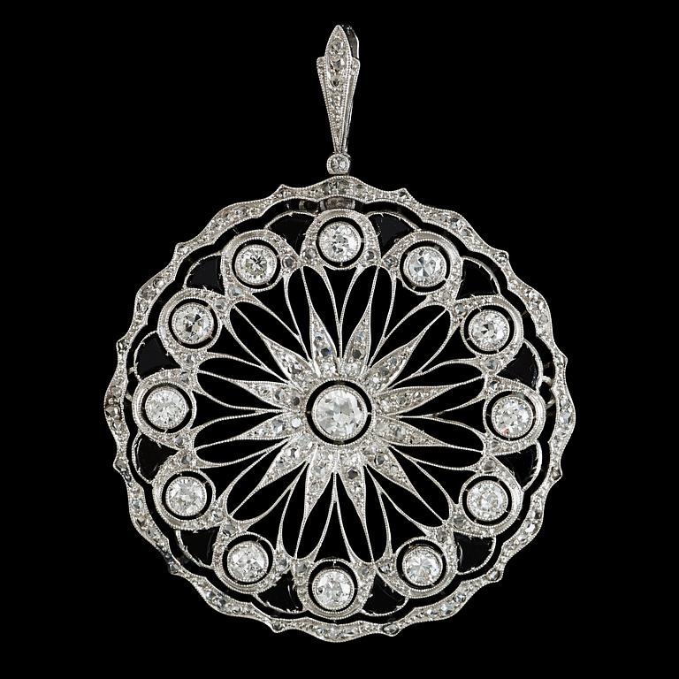 An onyx and old-cut diamond pendant. Total carat weight circa 1.50 cts.