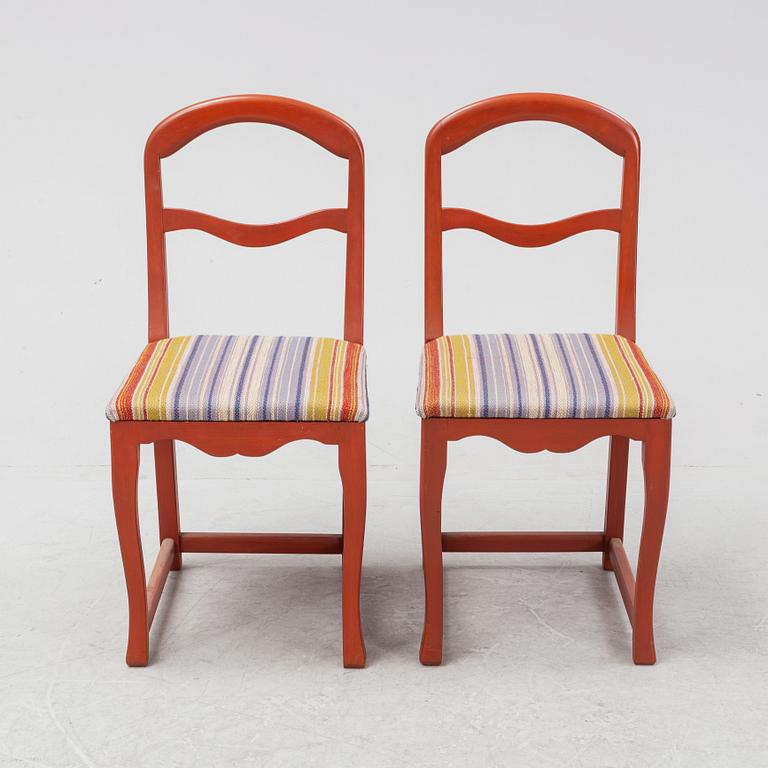 A pair of painted chairs by Carl Malmsten, second half of the 20th Century.