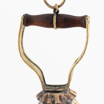 A metal storm lantern, marked A.T, circa 1900.