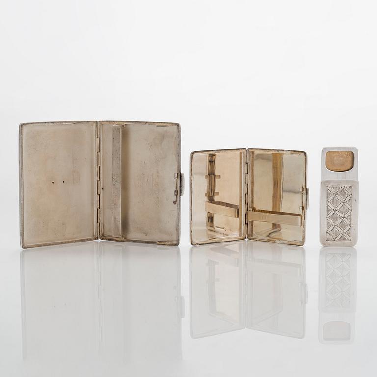 Two silver cigarette cases and a box, Belgium and Finland.