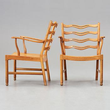 Ole Wanscher, a pair of walnut armchairs, model 1755 for Fritz Hansen, Denmark 1945.