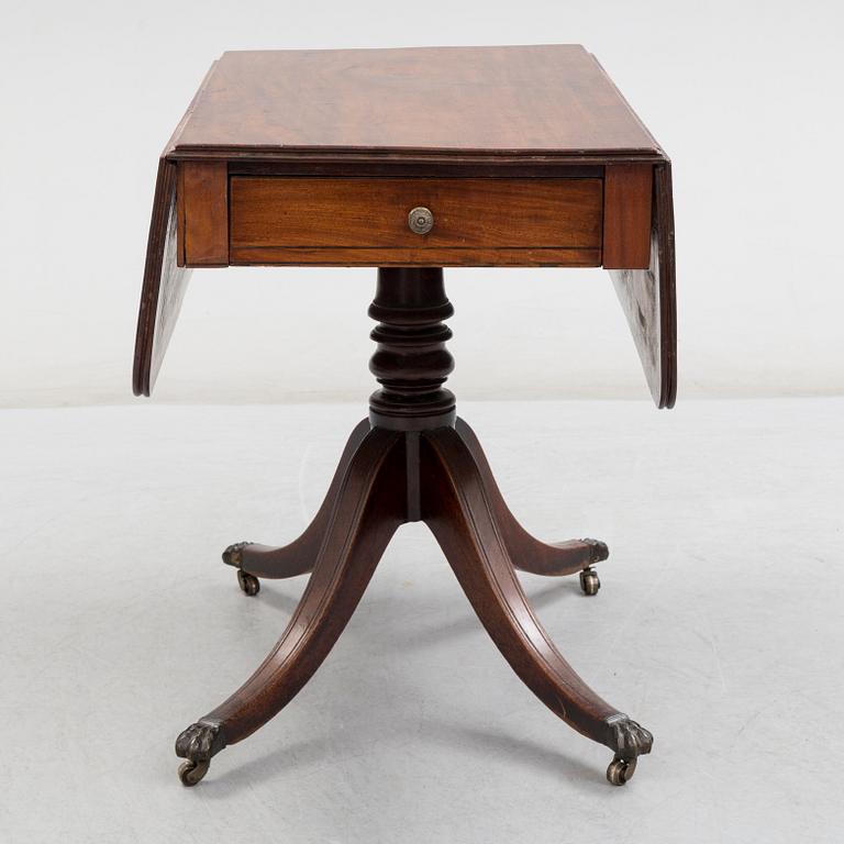 A mahogany table, England, late 19th / early 20th century.