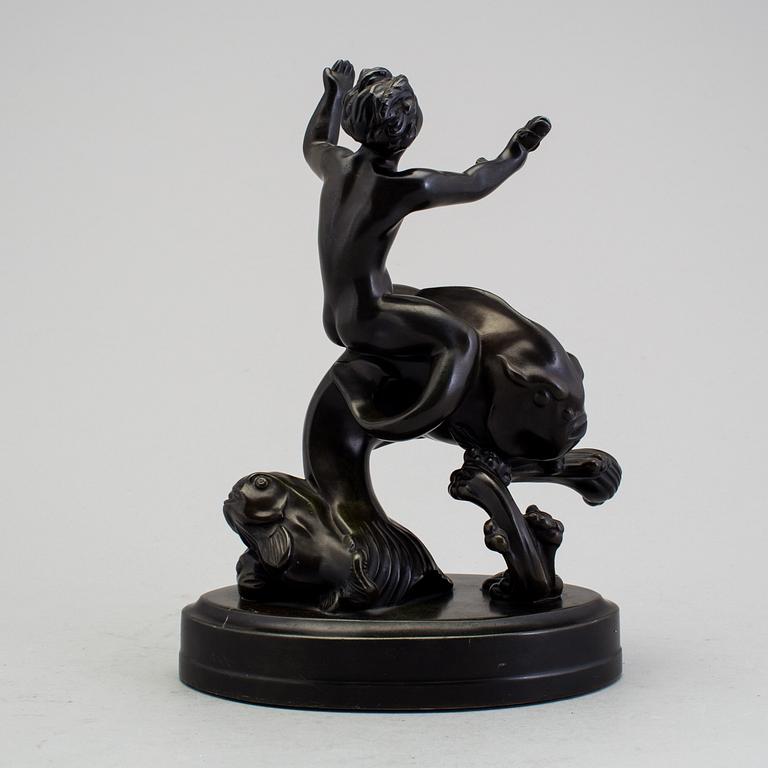 A JUST ANDERSEN sculpture.