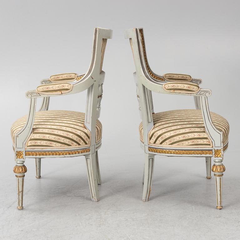 A pair of Gustavian style armchairs, 19th Century.