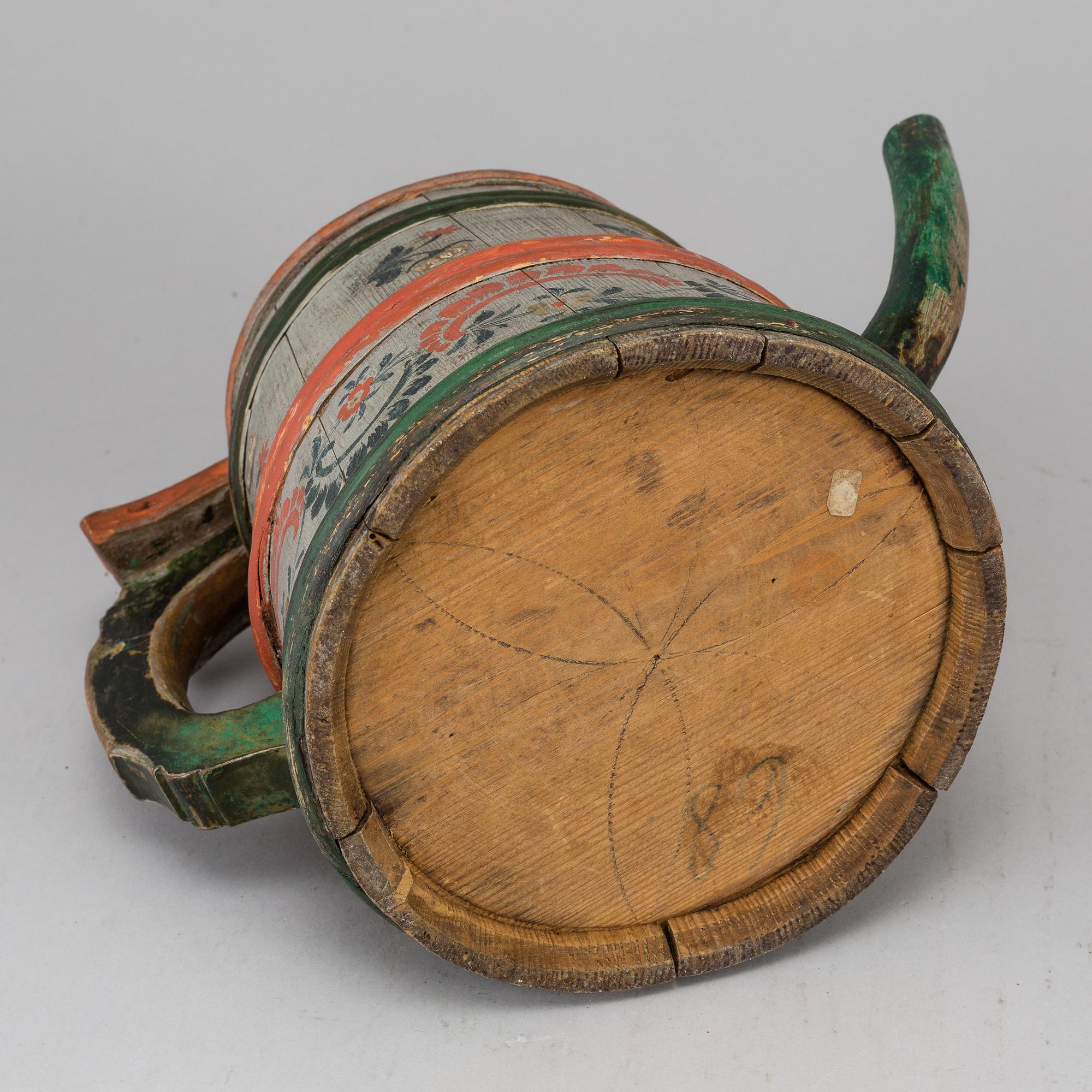 A painted wooden jar from the 19th century.
