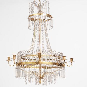 A Gustavian gilt brass and cut glass nine-branch chandelier, Stockholm late 18th century.