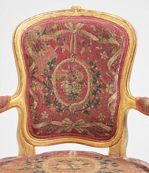 A pair of Gustavian giltwood open armchairs, Stockholm, late 18th century.