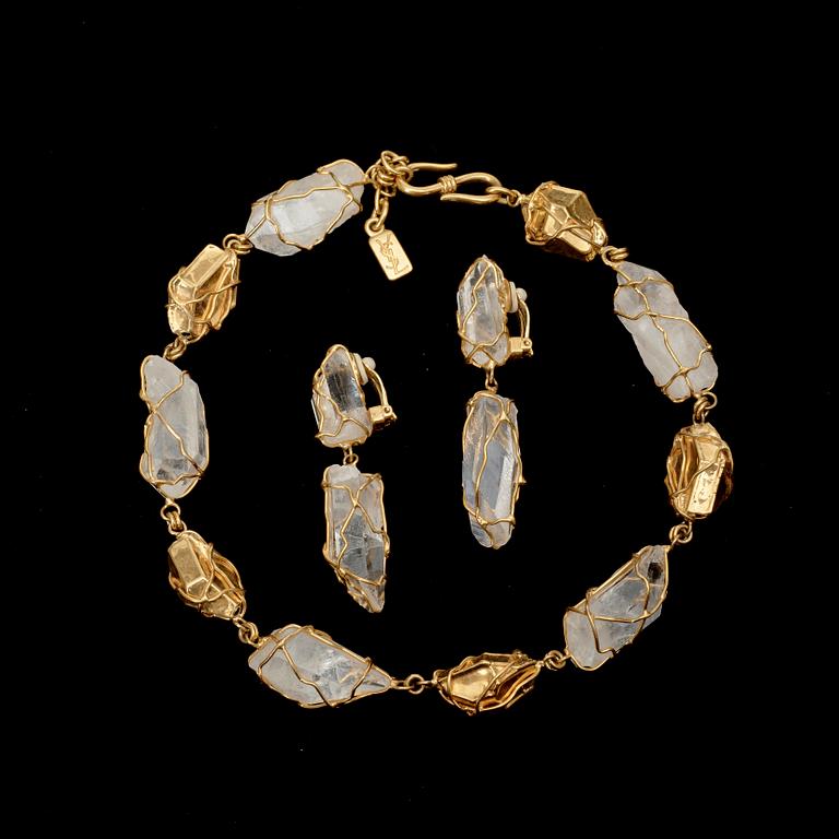 A necklace and a pair of earrings by Yves Saint Laurent.