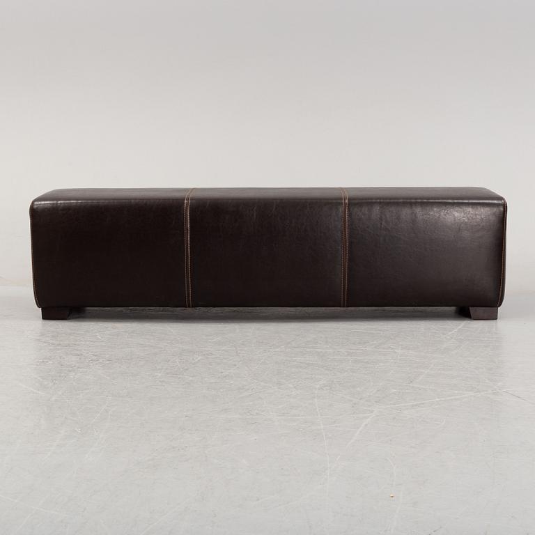 A leather-upholstered bench from Industria Divani e Poltrone, Italy.