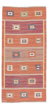 426. Märta Måås-Fjetterström, a carpet, "Röd grön äng", flat weave, ca 218 x 104 cm, signed AB MMF.
