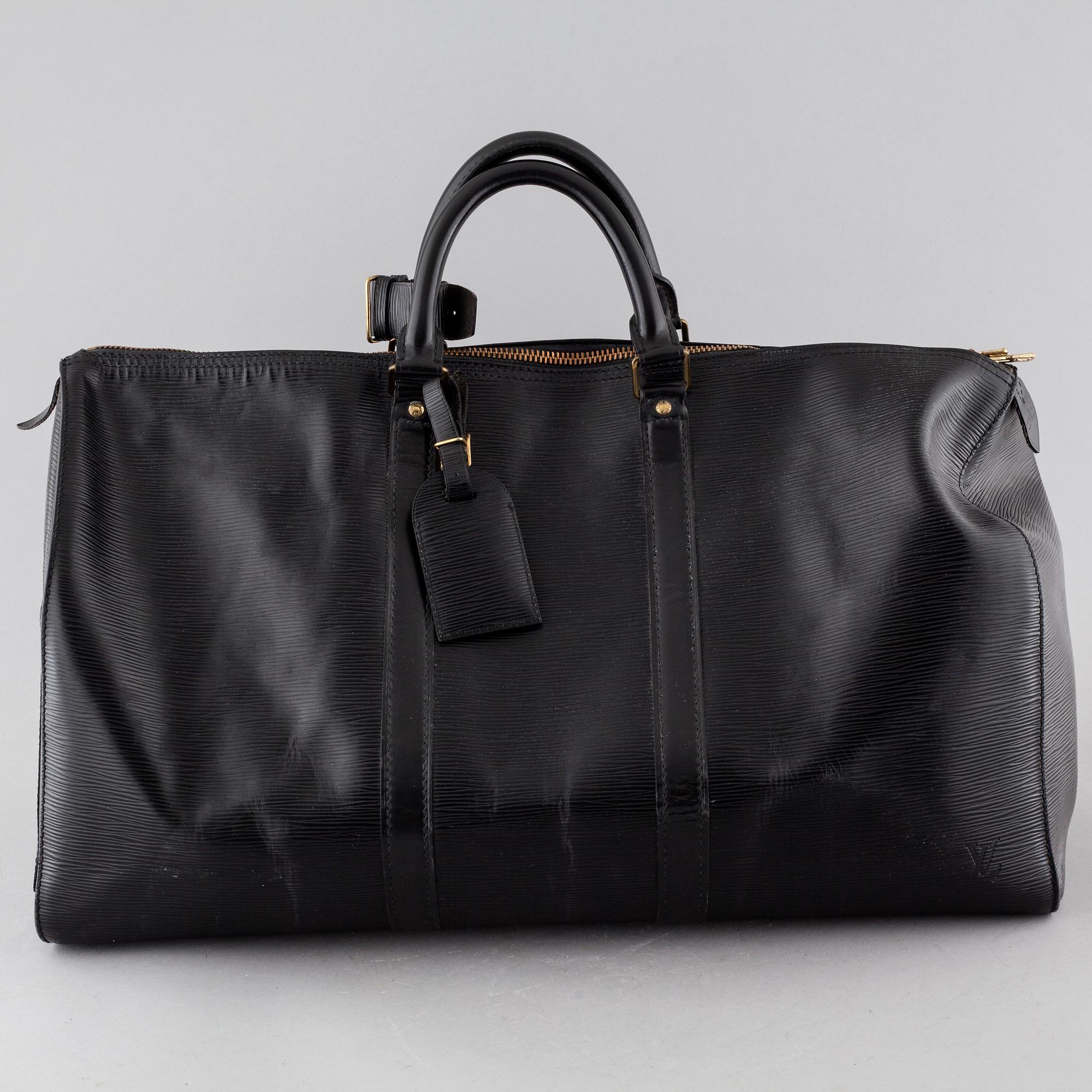 A weekend bag from Louis Vuitton, model "Keepall 50 Epi".