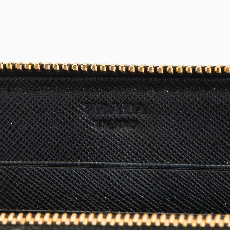Prada, a wallet.