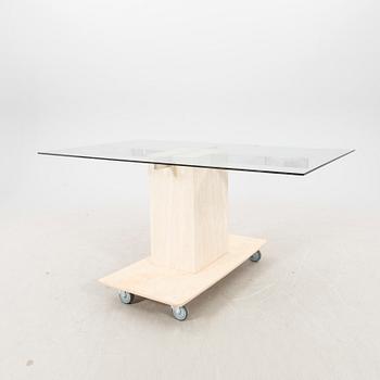 A late 20th century travertine dining table.