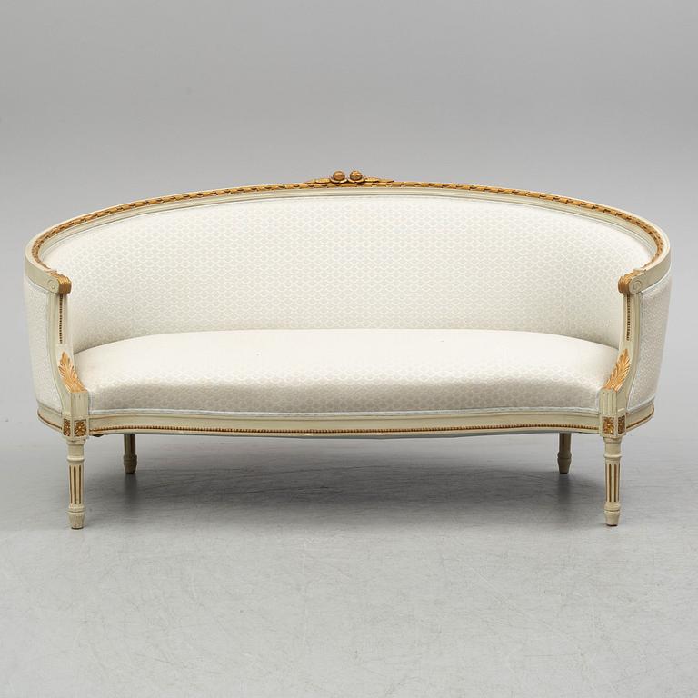 A sofa, four chairs and a table, gustavian style, early 20th century.