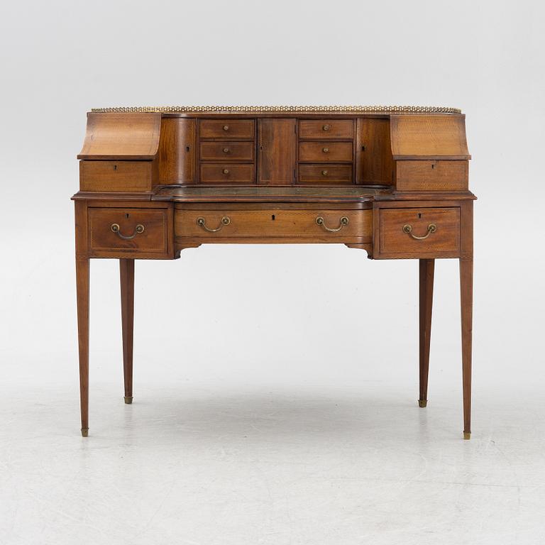 An English 19th Century Mahogany "Carlton House Desk".